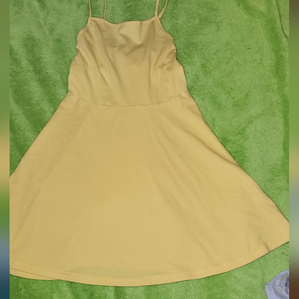 PLACE flowing/flared  spaghetti strap dress with tie back.